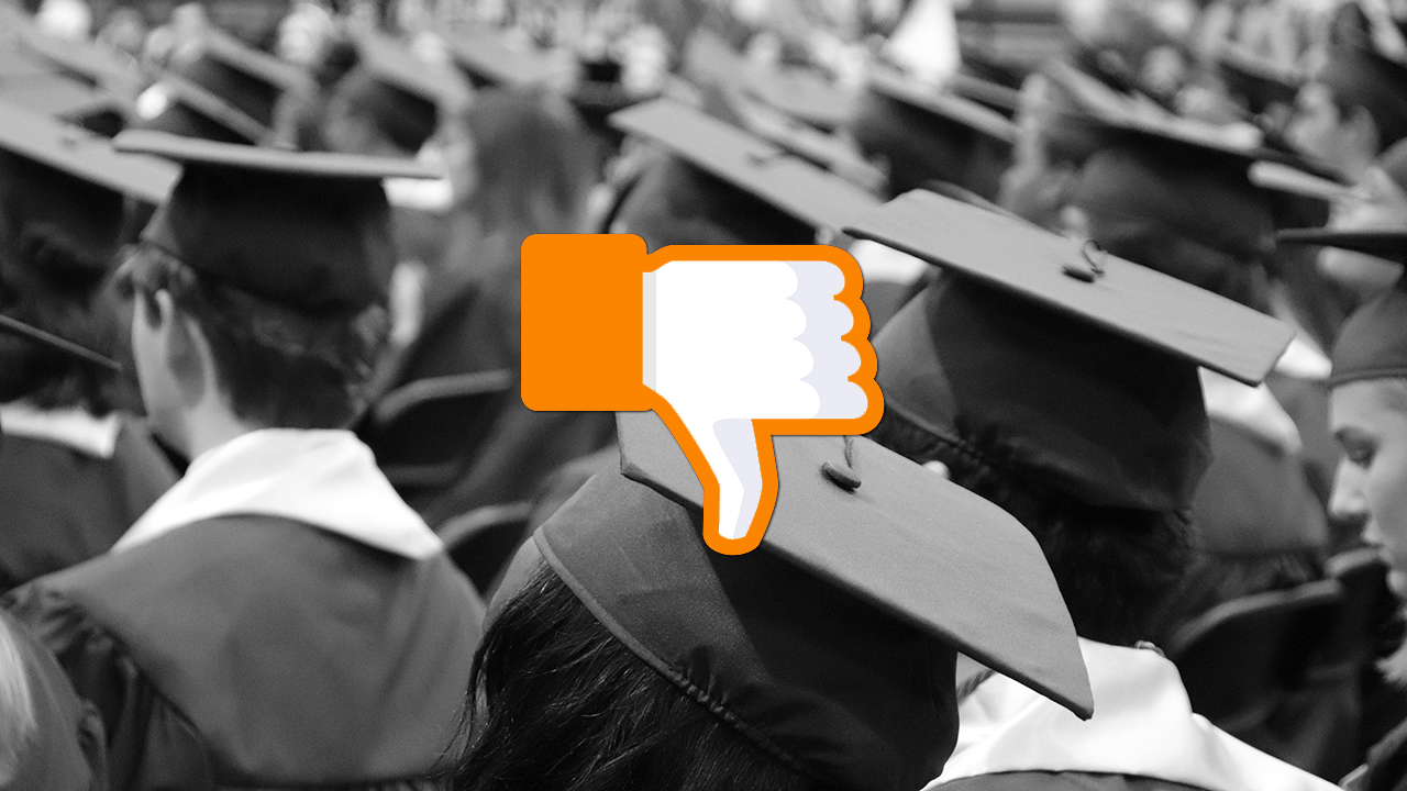 thumbs down over a graduation photo