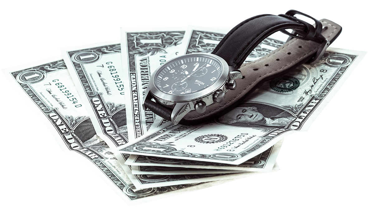 photo of a watch sitting on money